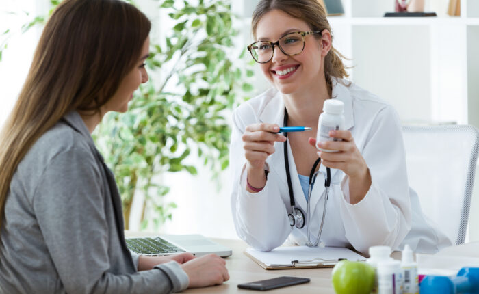 medical weight loss doctor advising a patient